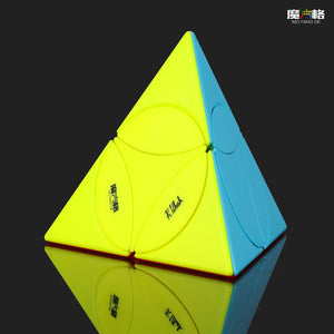 QiYi Coin Pyraminx, a coin-shaped twist puzzle with a pyramid structure.